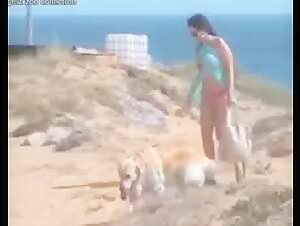 Bestiality: Woman and dog in a shocking scene