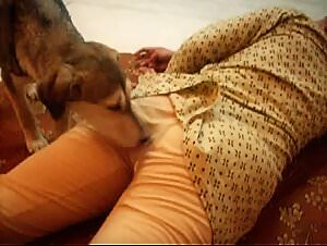 Dog fucker: zoophilia lovers explore sexy Indian woman's butt