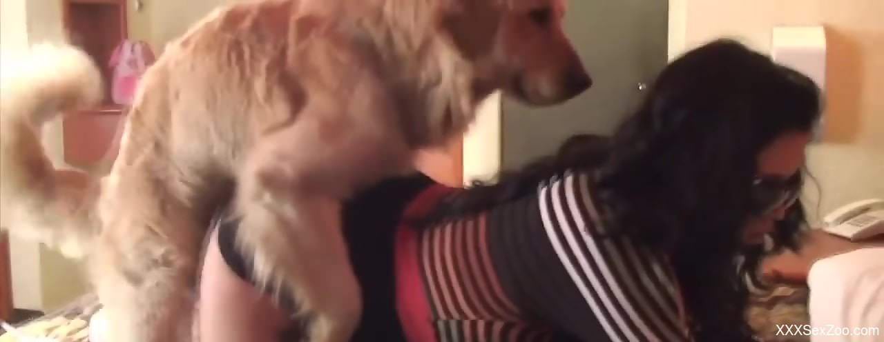 Hot woman puts entire dog dick up her mouth during home XXX