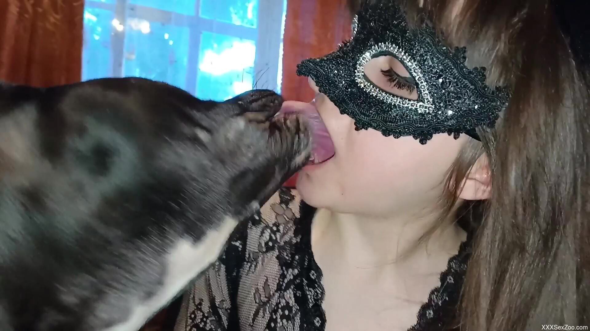Masked broads share dog dick on cam in very sexy zoo threesome