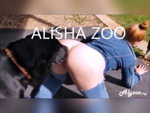 Blond girl seduced by dog in nature