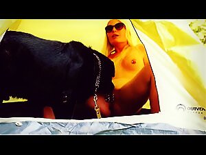 Blonde unmasked blonde fucks with dog by tent, beasiality zooporno