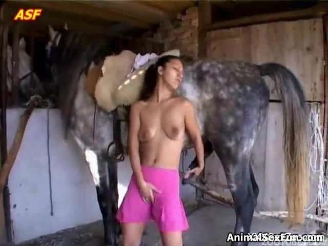 Needy beauty leads giant horse dick right up her tiny pussy