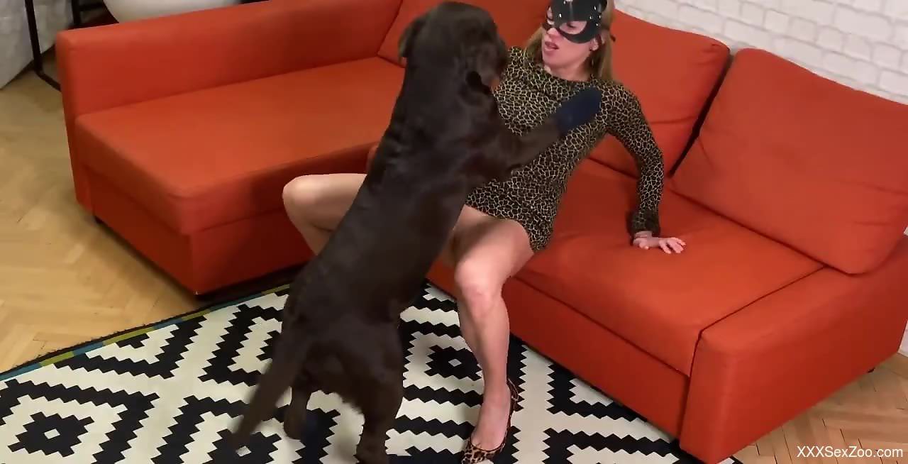 Clothed woman strips and lets her dog fuck her