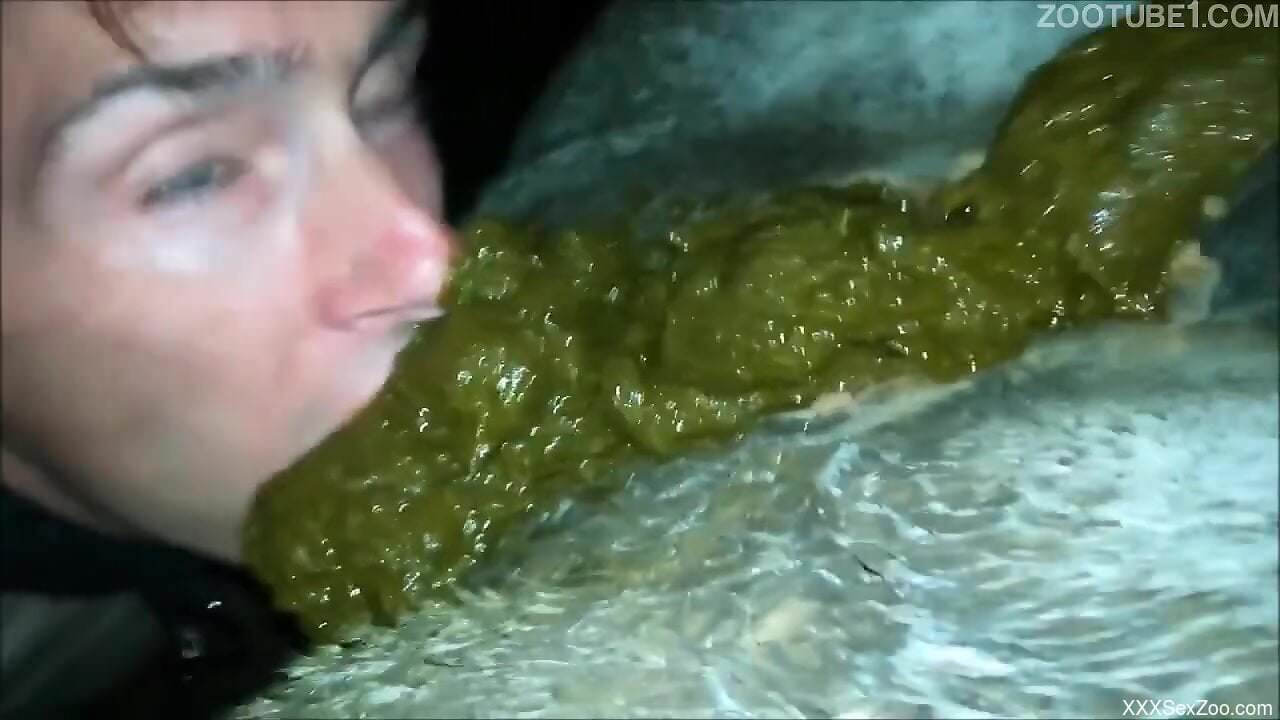 Intrigued man slides fingers in the animal's ass and pussy