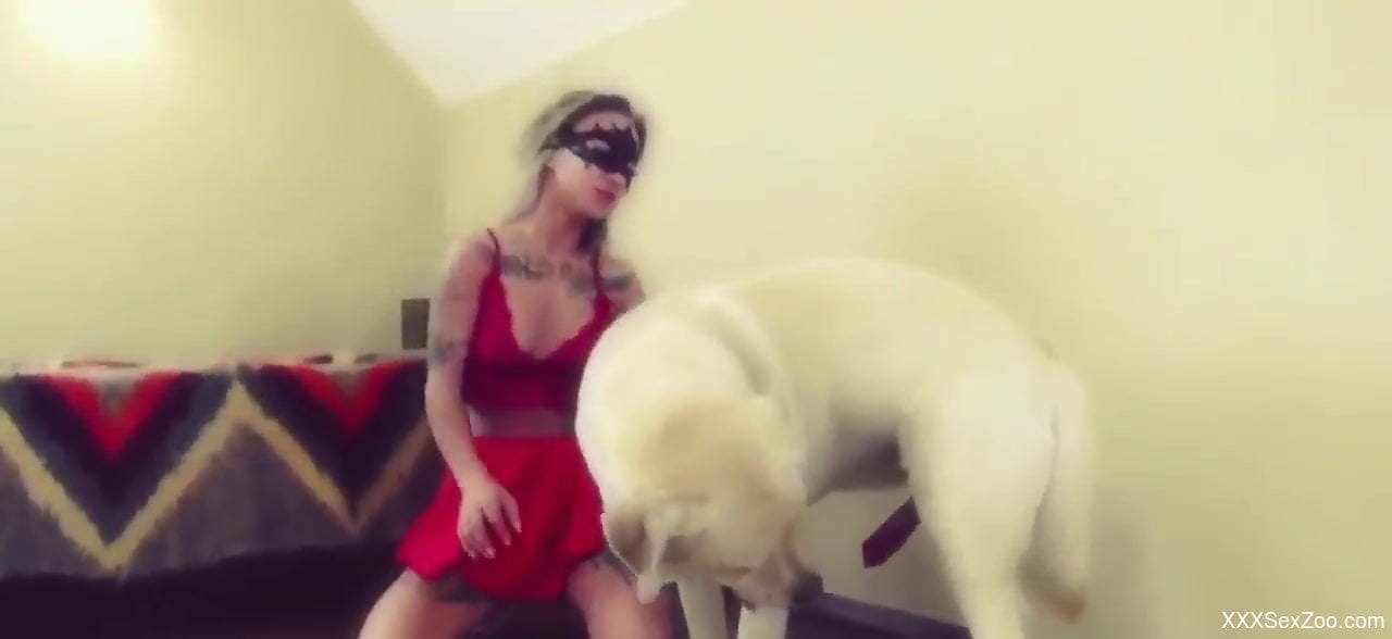 Delightful zoophile in red fucked from behind