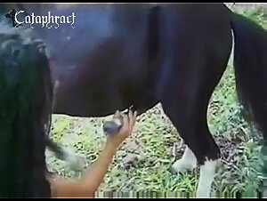 Girl fucking dog gets fucked by dog cock and sucks her dog on animal tube