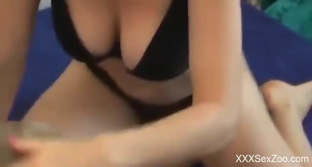 Busty nude female sucks a dog dick during her webcam show