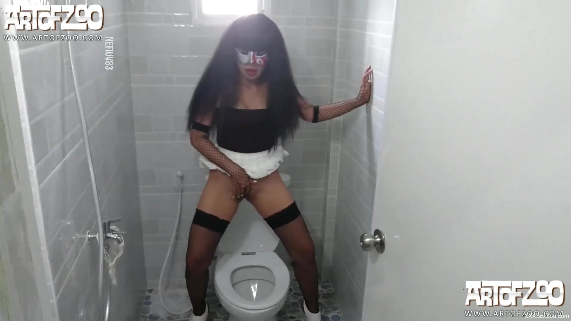 Brunette in fishnets gets fucked by a black dog