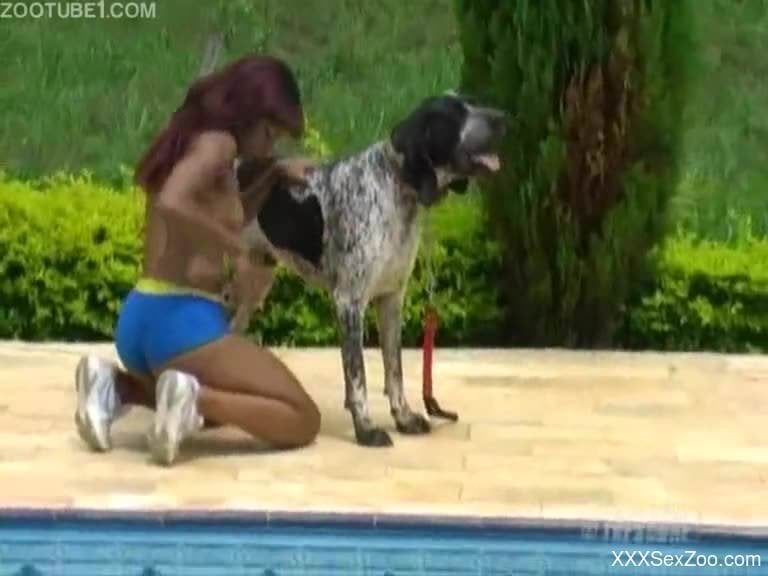Tanned and exotic babe fucked by a big-dicked dog