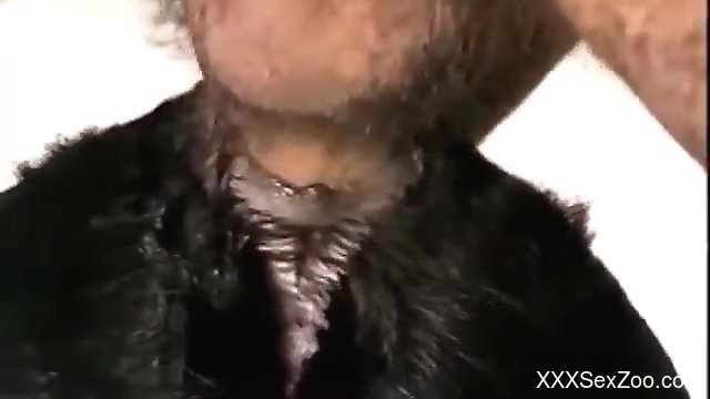 Hot guy with a hairy cock fucking a black dog