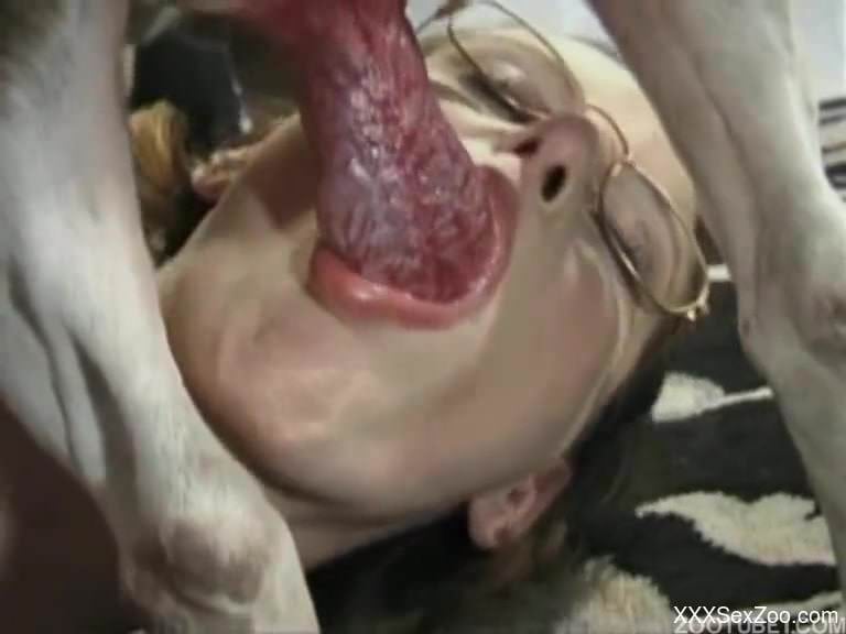 Nerdy amateur zoophile knows how to suck dog dick in a proper way