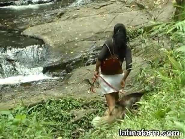 Chick is giving a nasty blow job to her dog