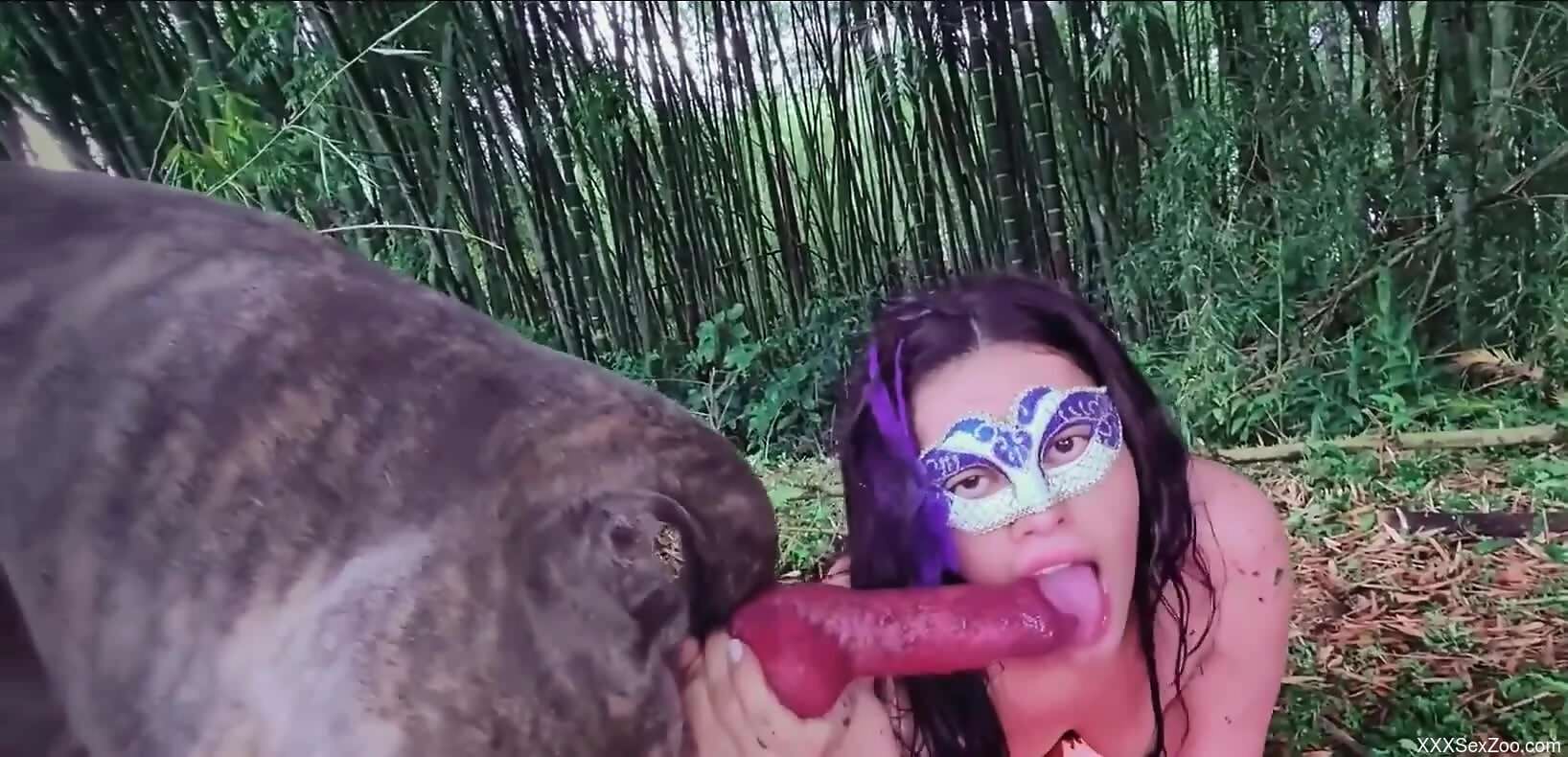 Brunette in a mask is going to suck dick outside