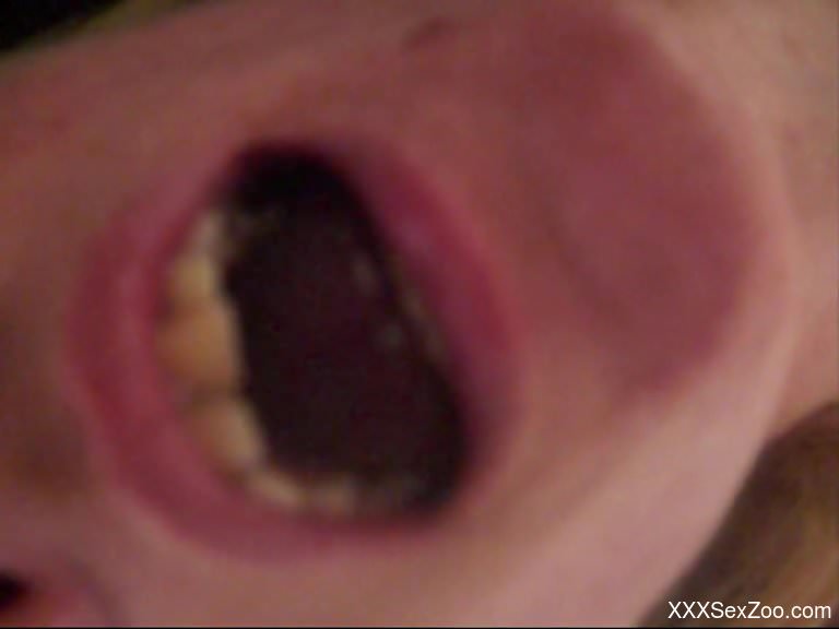 Mature zoophile proudly showing her cum-filled mouth